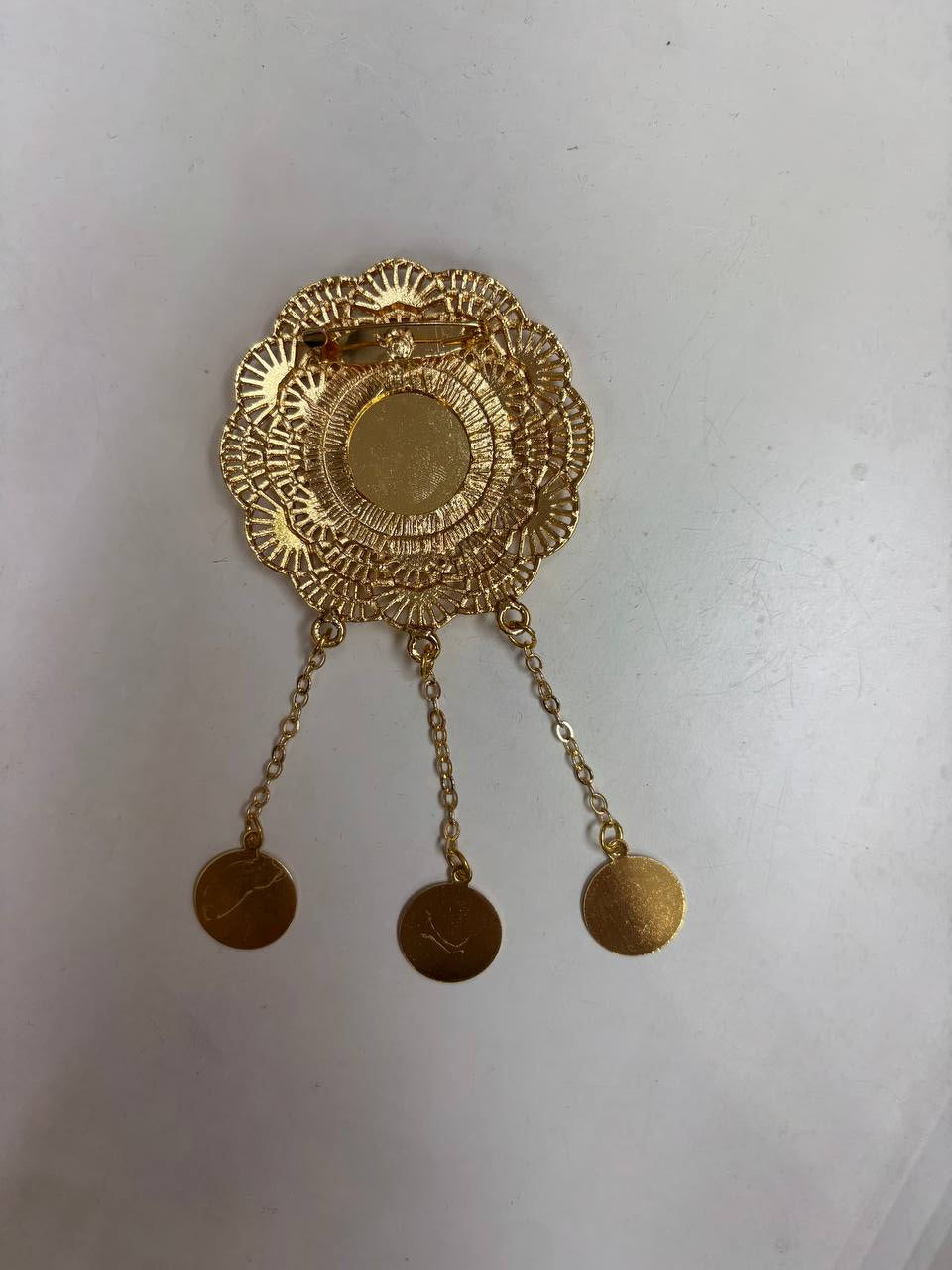 Lera Pin in Imitated Gold with intricate floral design and three dangling circular charms