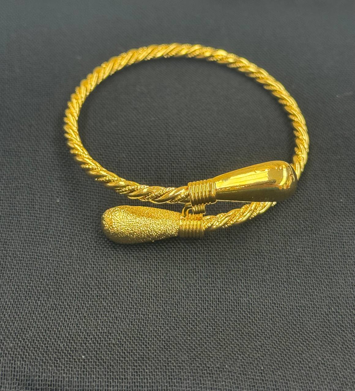 Palestinian Elegance imitated gold Mabroume Single Injasa Bracelet with twisted band design