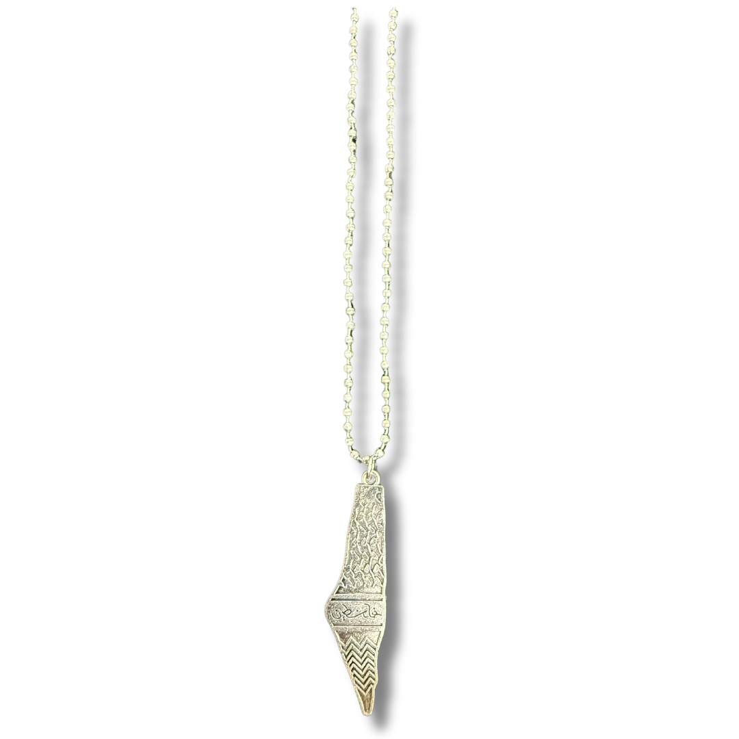 Silver kuffiyeh necklace with detailed pendant and beaded chain from Palestinian Elegance