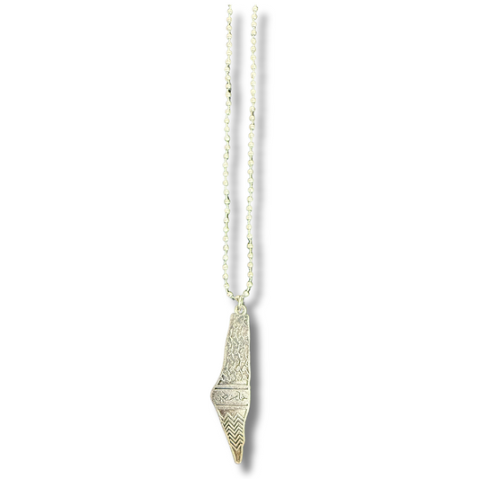 Silver kuffiyeh necklace with detailed pendant and beaded chain from Palestinian Elegance