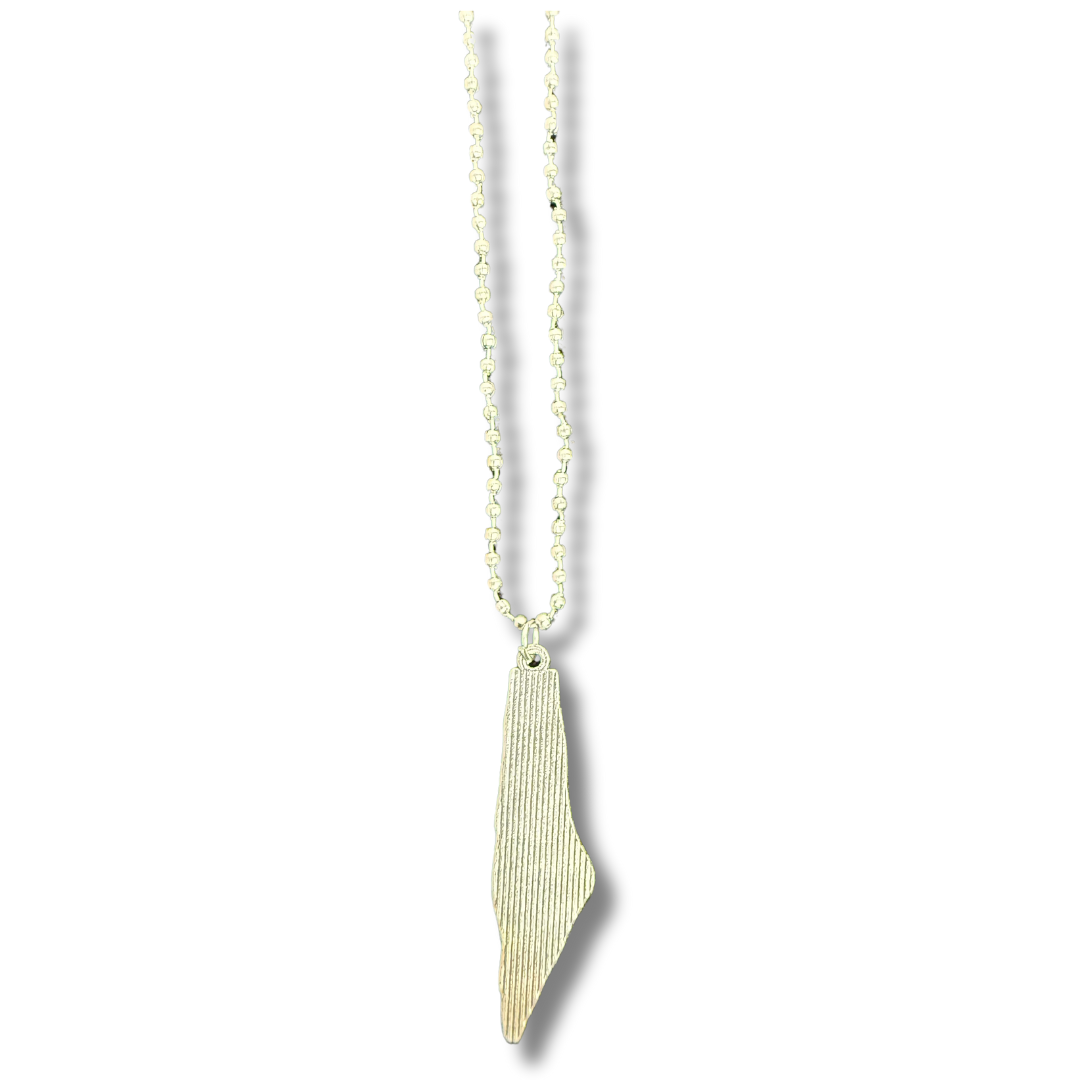 Silver kuffiyeh necklace by Palestinian Elegance with detailed pendant and beaded chain