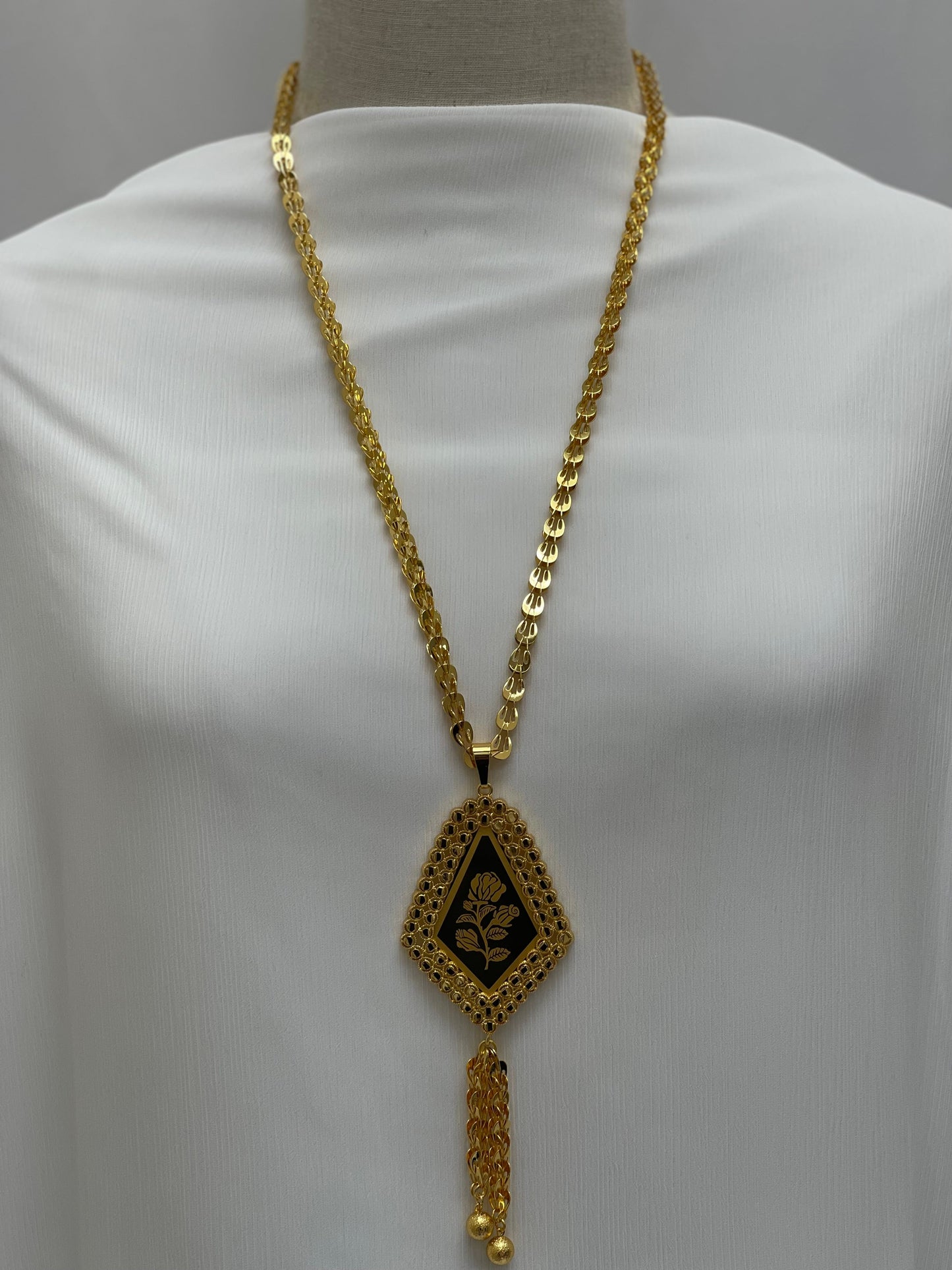Palestinian Elegance long rose pendant necklace with gold chain and intricate floral design