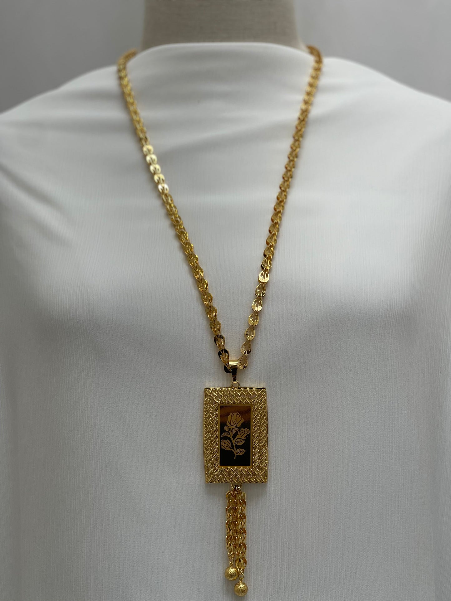 Palestinian Elegance long rose pendant necklace with gold chain and rectangular floral design