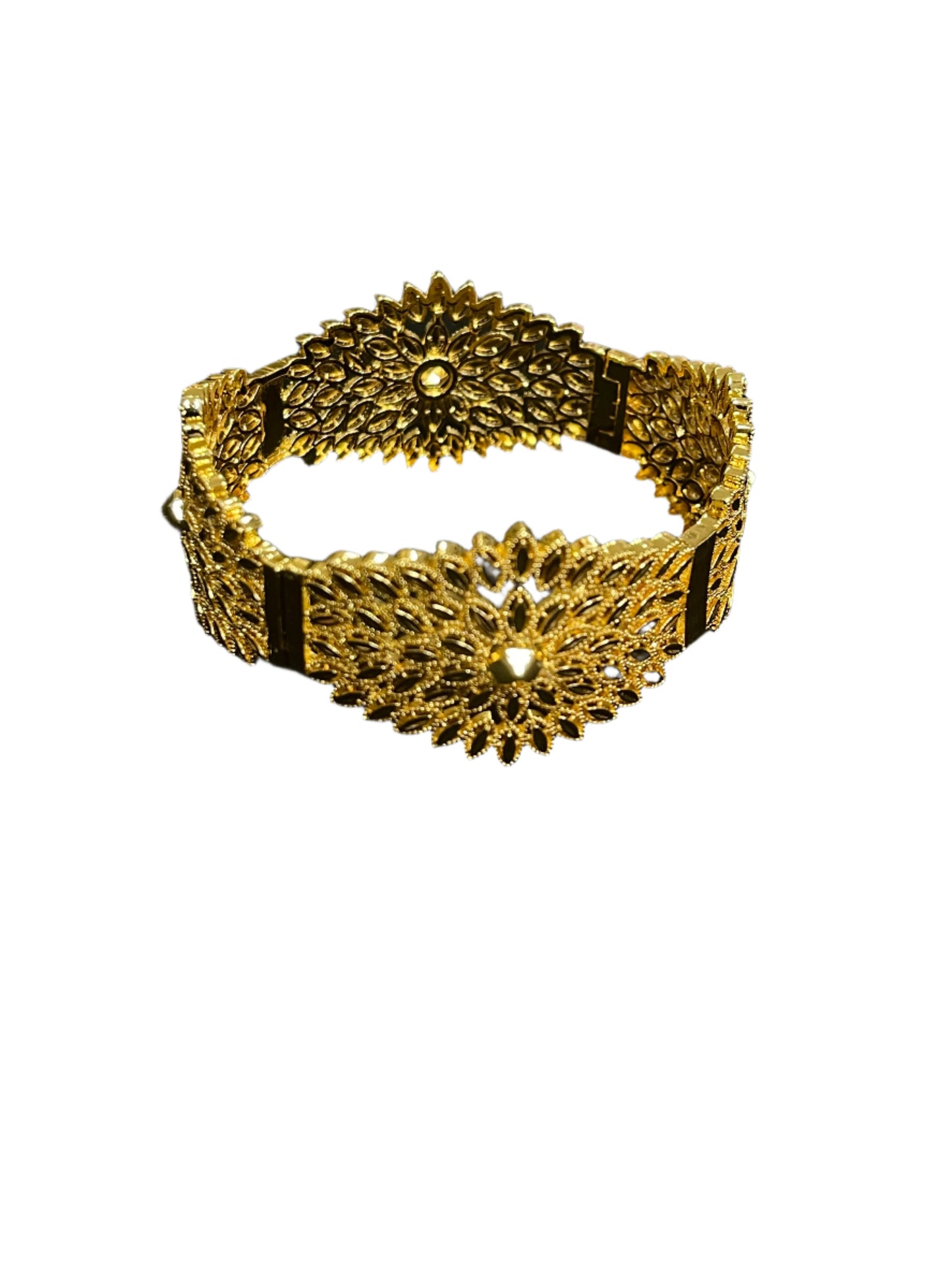 Palestinian gold jewelry set featuring an intricately designed gold bracelet with floral patterns