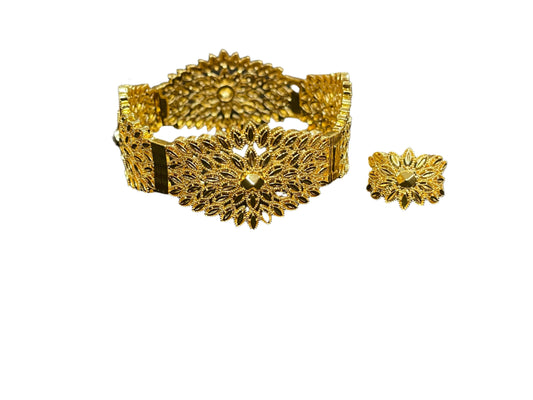 Palestinian gold jewelry set featuring an intricately designed gold bracelet and matching ring