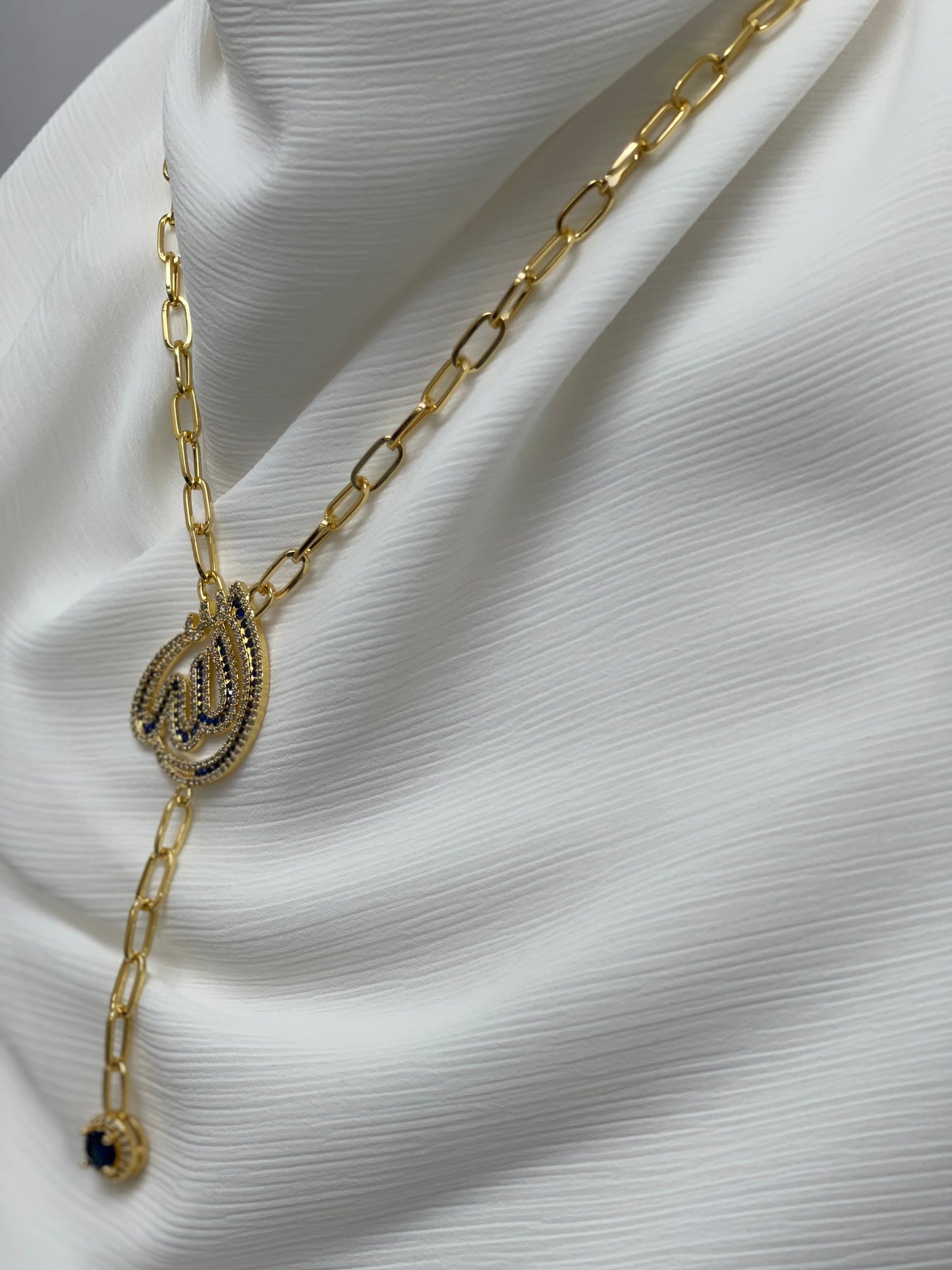 Elegant Allah name necklace with gold chain and black stone detailing by Palestinian Elegance