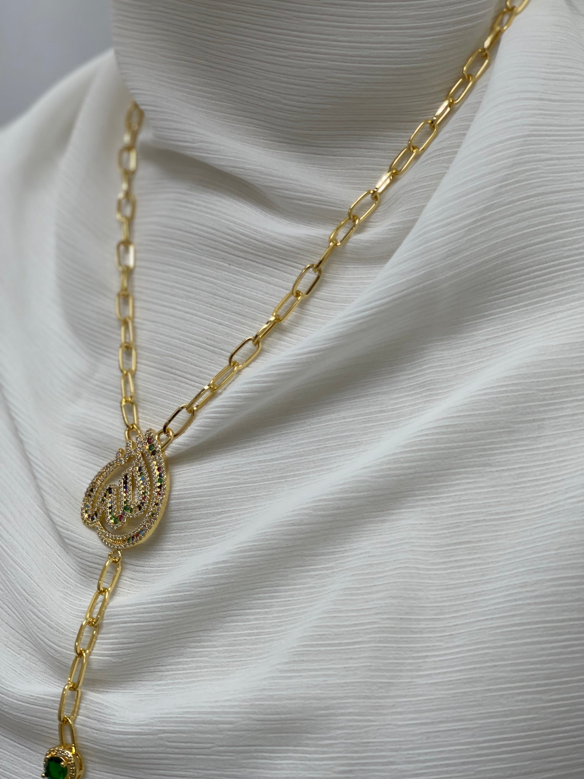 Gold chain Allah name necklace with intricate pendant design from Palestinian Elegance accessories