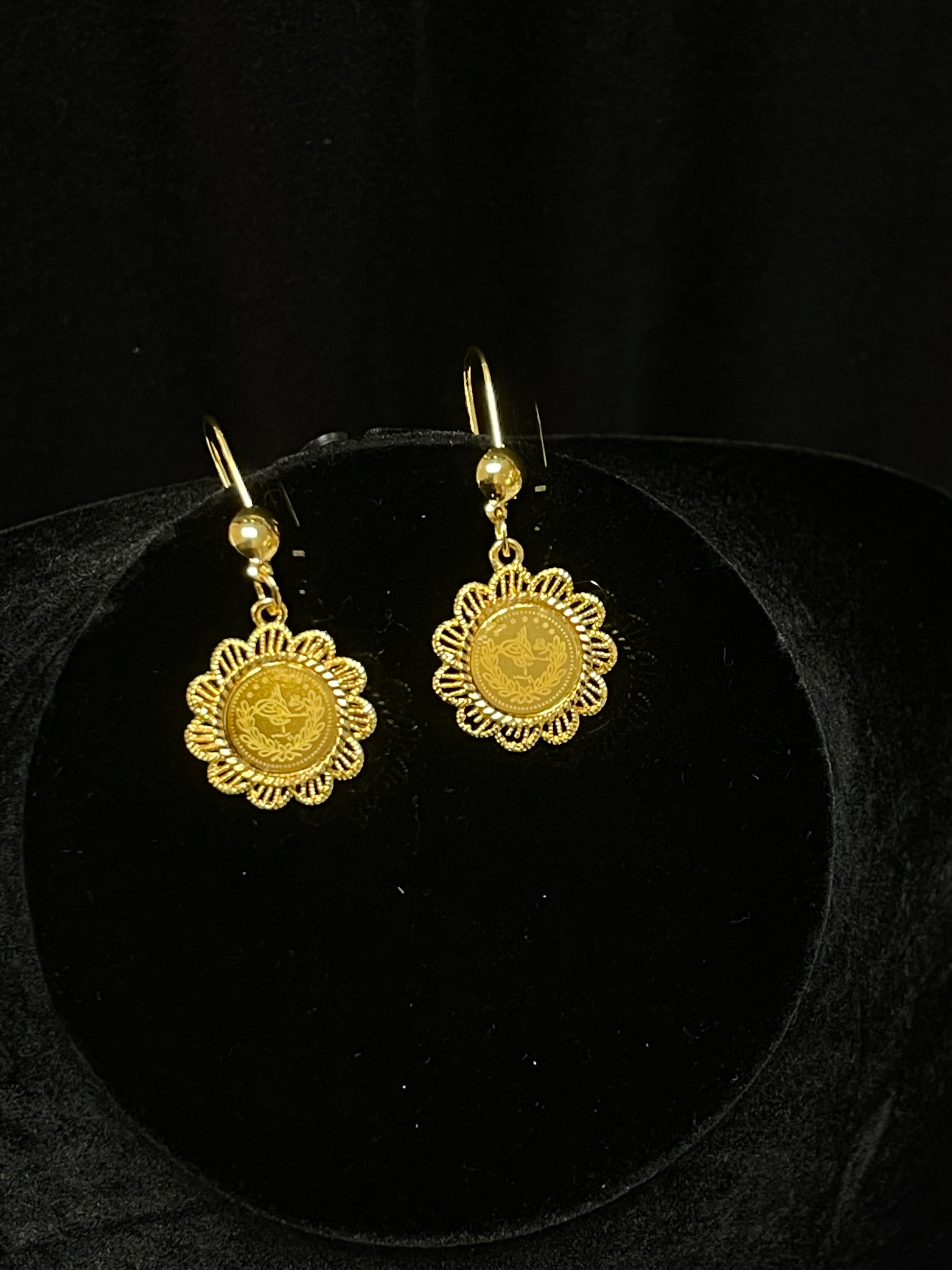 Palestinian Elegance imitated gold Gold Coin Necklace Set with intricate floral design earrings on black stand