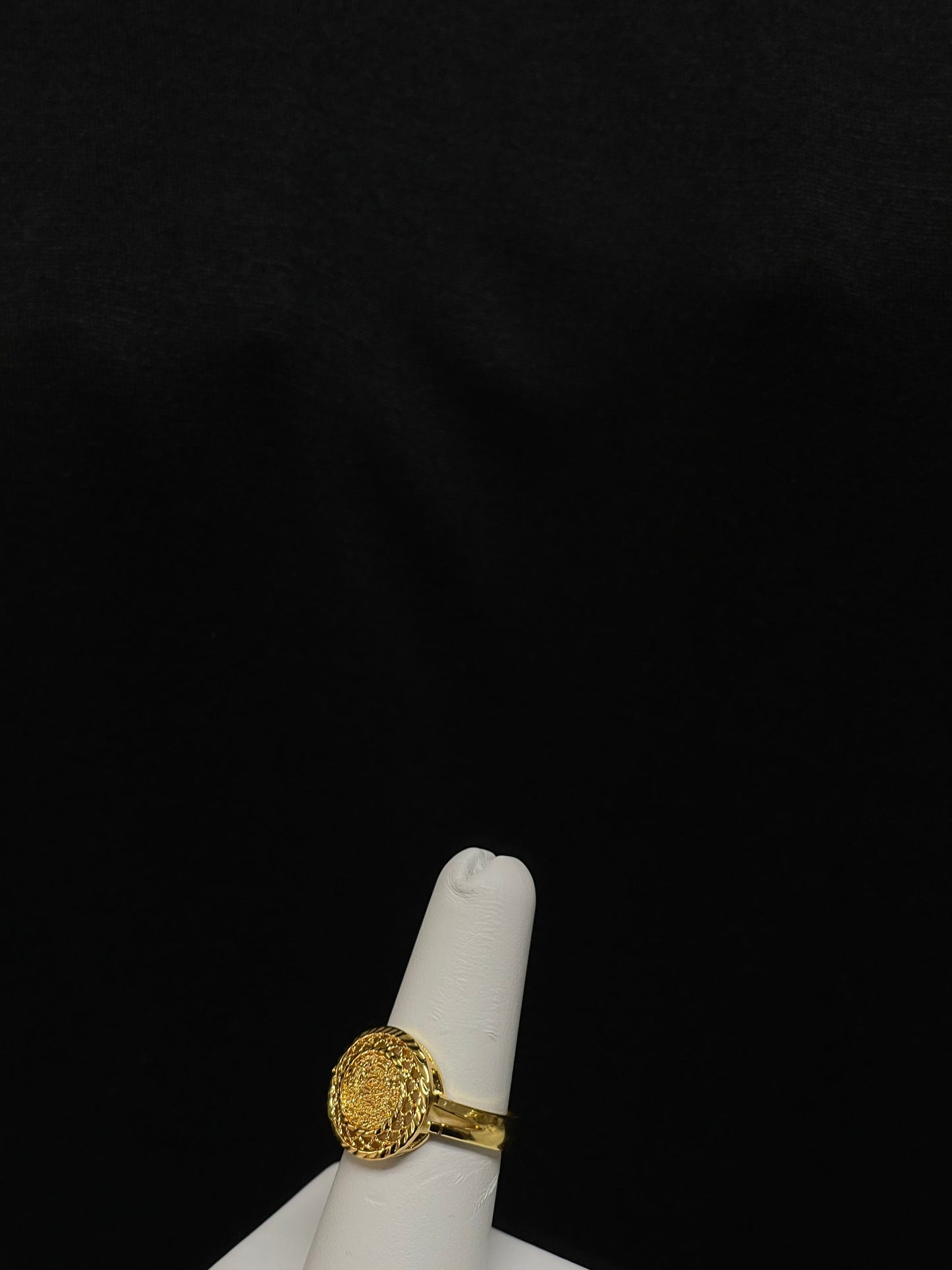 Palestinian Elegance gold layered necklace set ring with intricate design on white display