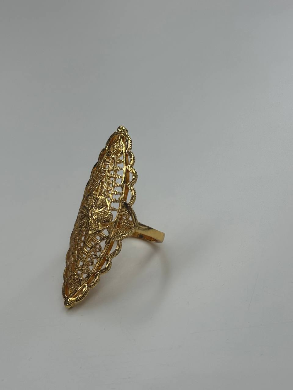 Imitated gold ring from Palestinian Elegance with a unique flower ring design and intricate filigree detailing