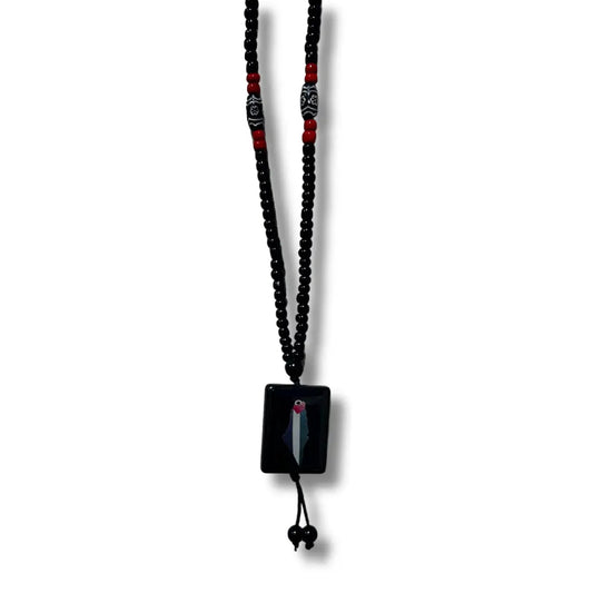 Palestinian Elegance handmade Palestine necklace with black and red beads and rectangular pendant