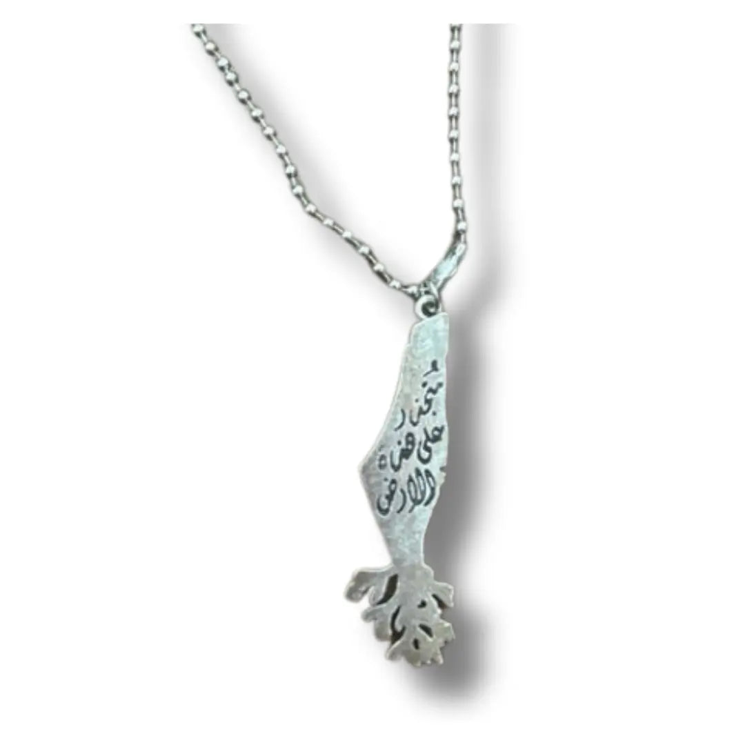 Handmade Palestinian silver necklace with intricate map-shaped pendant and Arabic calligraphy detail