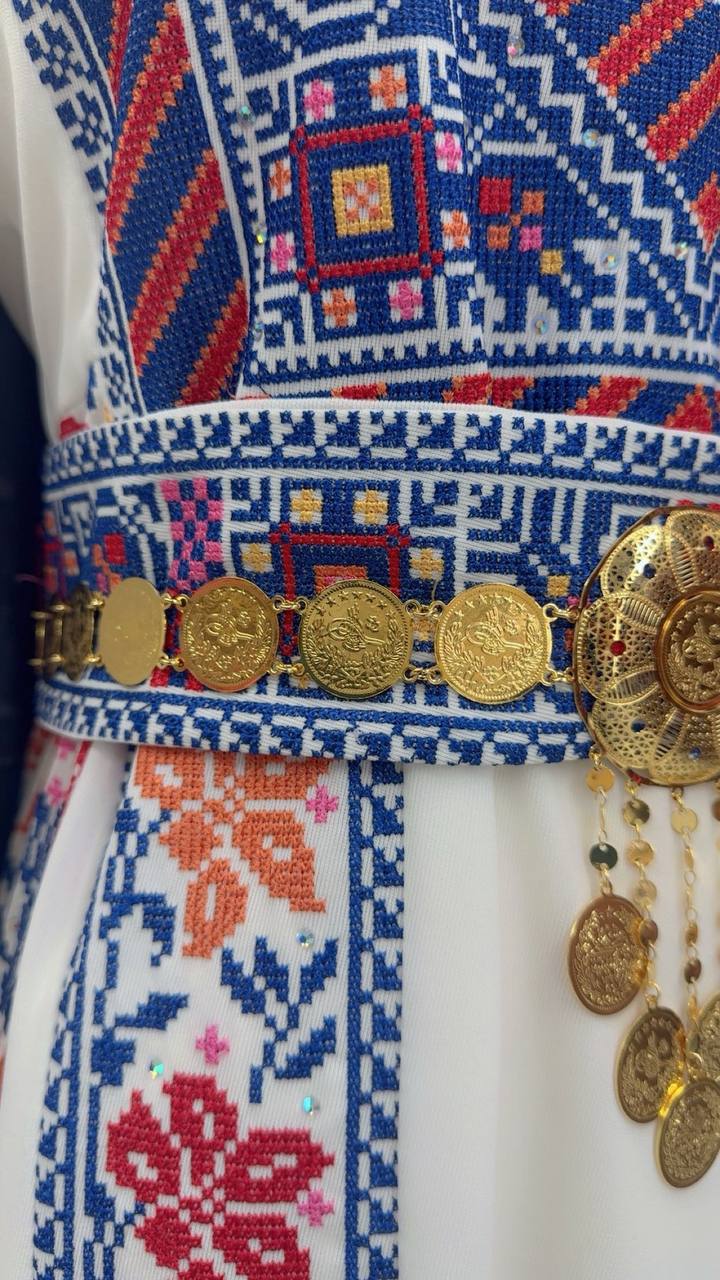 Palestinian Elegance imitated gold lera waist belt with intricate coin details on traditional embroidery