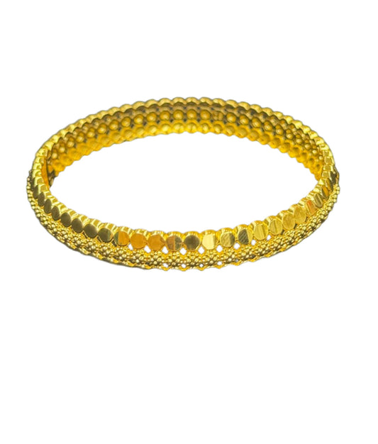 Palestinian Elegance imitation gold bangle bracelet with intricate textured design