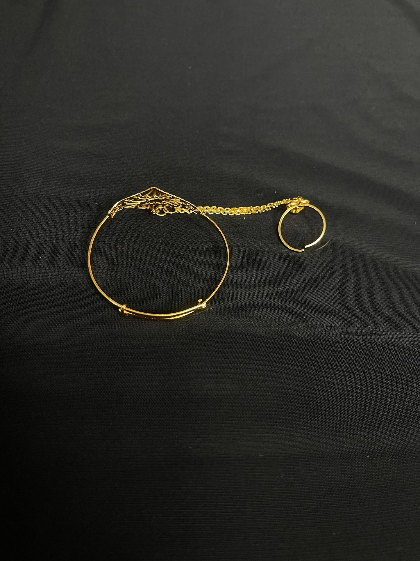 Kids Imitated Gold Bracelet with Adjustable Ring by Palestinian Elegance on black background