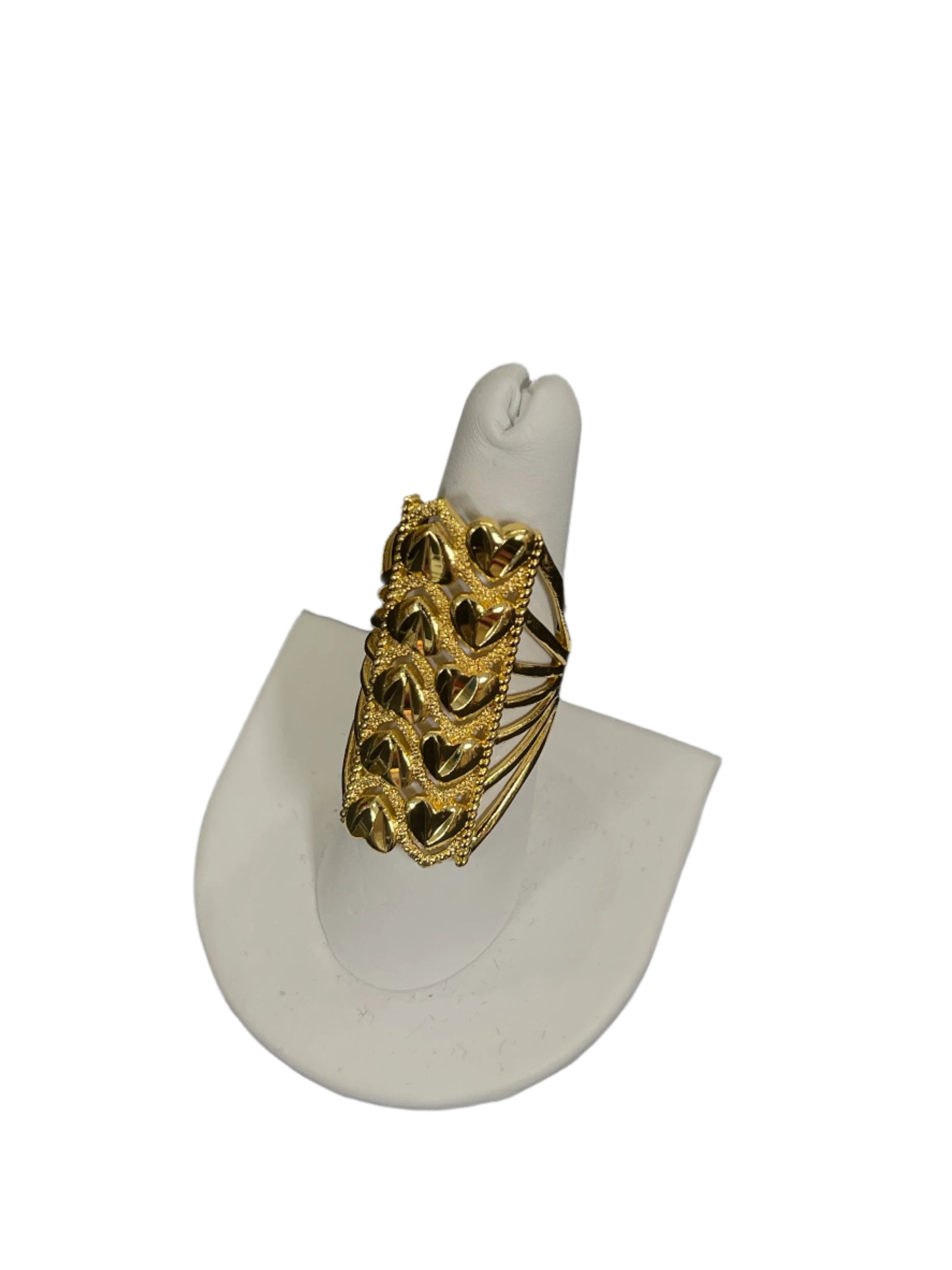 Layered hearts gold ring in imitated gold by Palestinian Elegance displayed on white ring stand