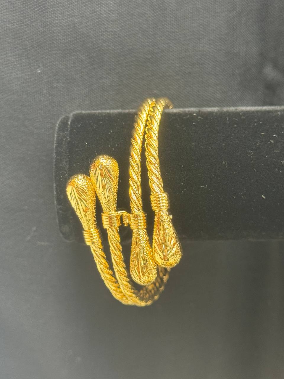 Palestinian Elegance mabroume bracelet gold twist imitated gold bracelet with intricate twisted design and teardrop-shaped ends