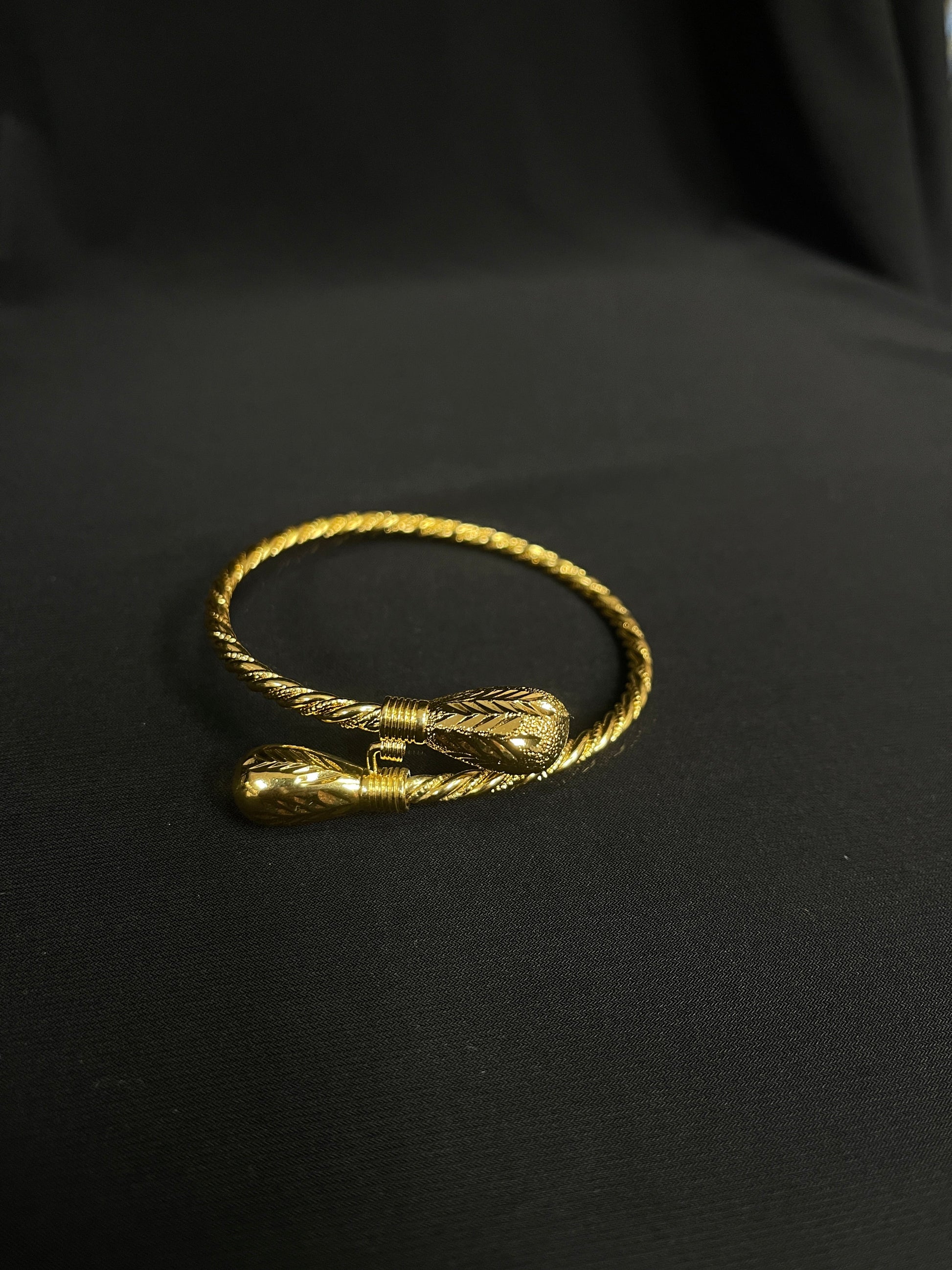 Mabroume imitated gold bracelet for women with twisted design and detailed ends by Palestinian Elegance