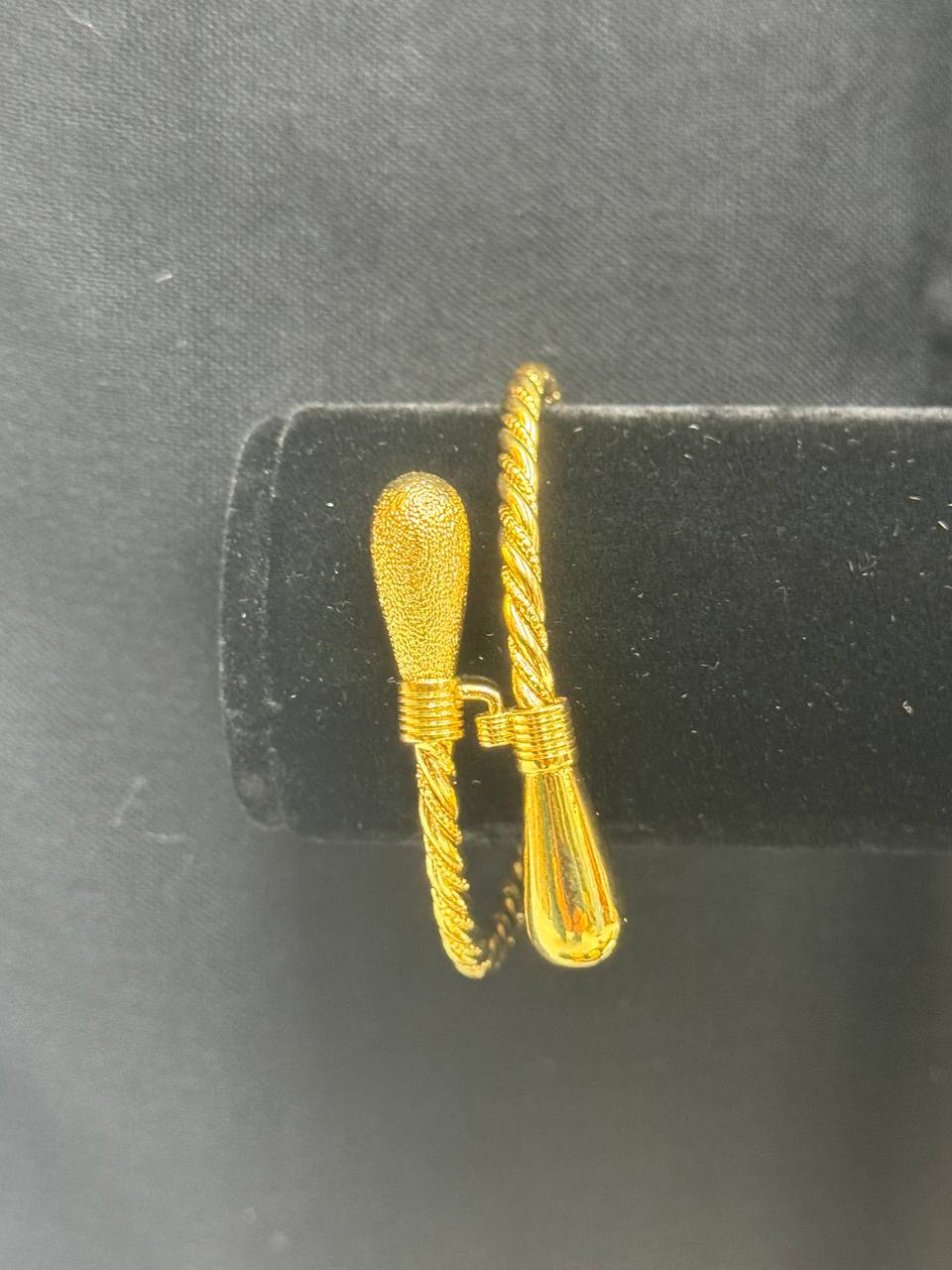 Palestinian Elegance Mabroume Single Injasa Bracelet in imitated gold with twisted design and decorative ends