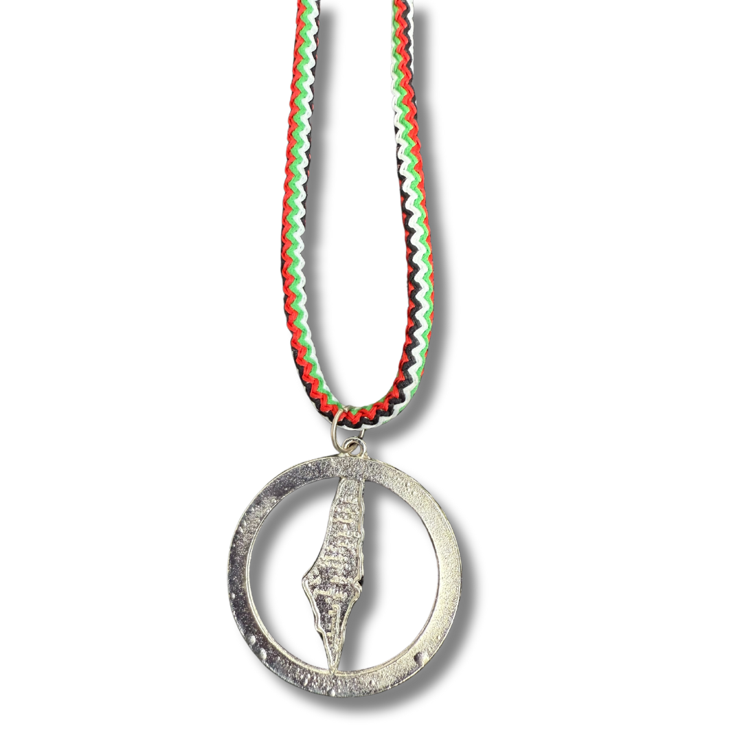 Palestine flag necklace with silver pendant and red, green, white, and black woven cord from Palestinian Elegance