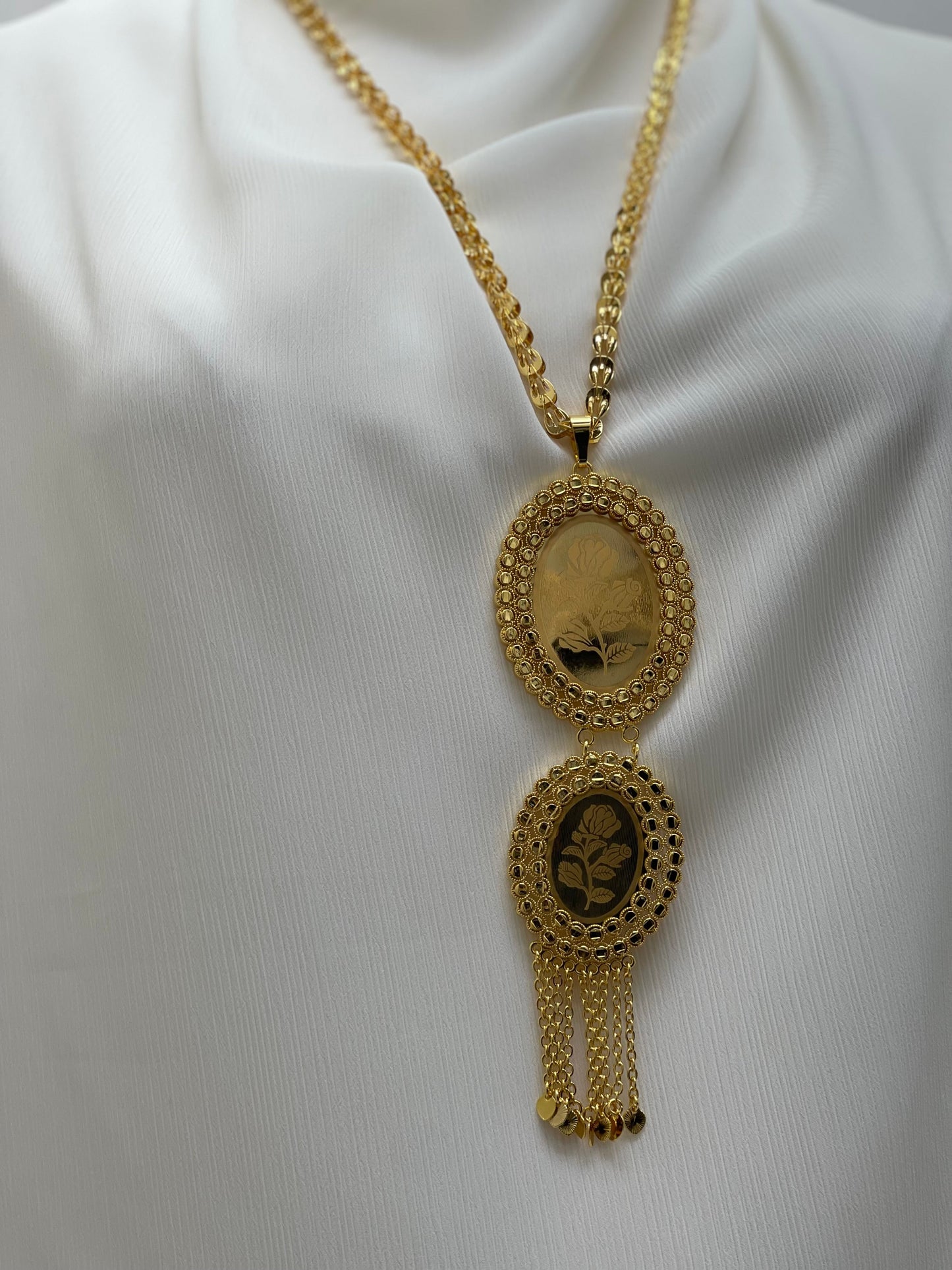 Palestinian Elegance imitated gold bracelet and necklace with intricate oval pendants and chain tassels