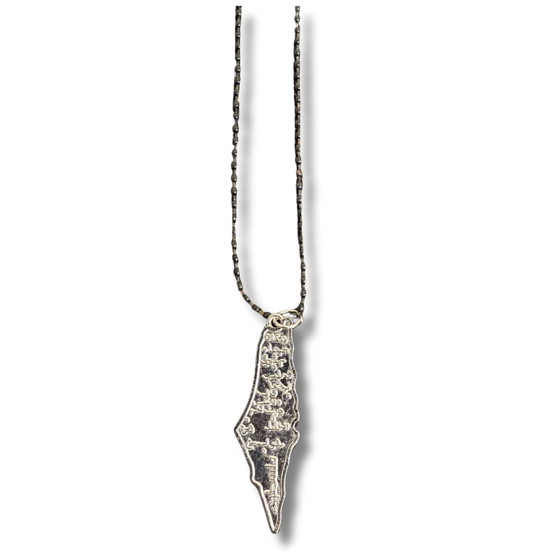 Palestinian map necklace with detailed silver pendant on a delicate chain from Palestinian Elegance