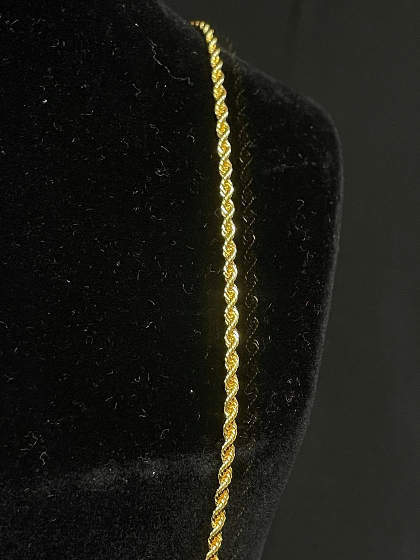 Plain Imitated Gold Necklace with twisted rope design displayed on black velvet stand
