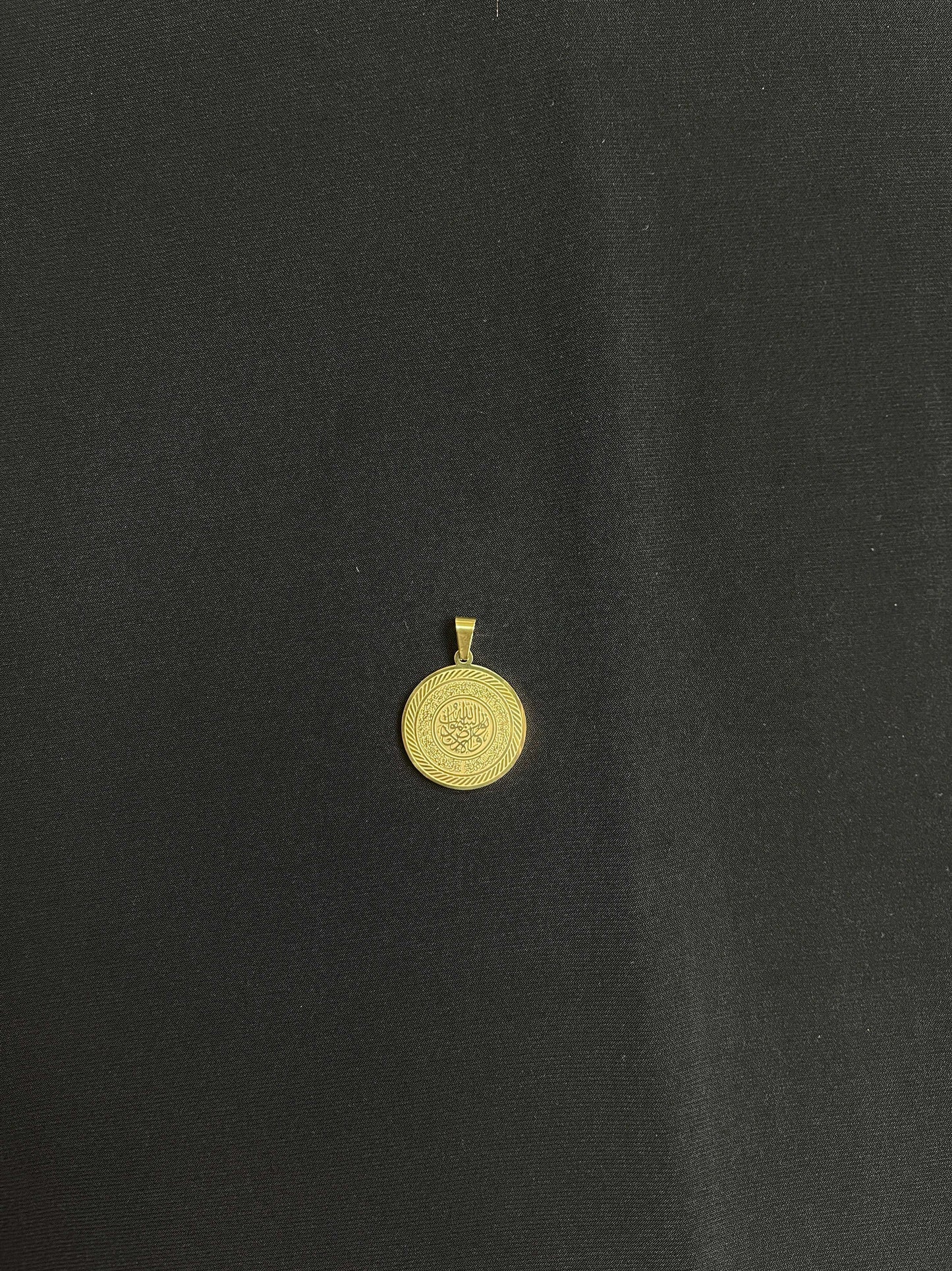 Imitated gold Quran Ayah gold bracelet pendant with intricate Arabic calligraphy by Palestinian Elegance