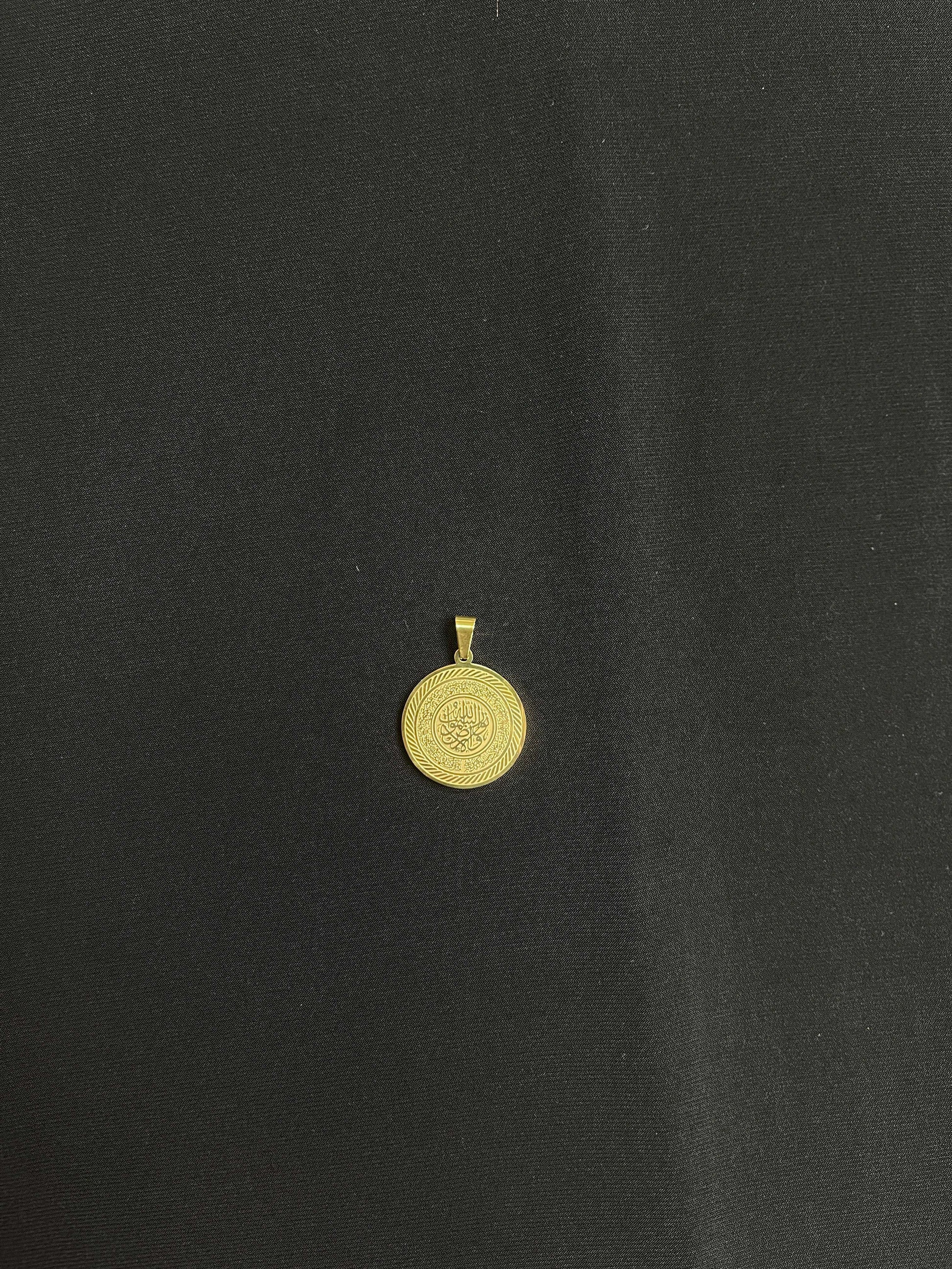 Imitated gold Quran Ayah gold bracelet pendant with intricate Arabic calligraphy by Palestinian Elegance