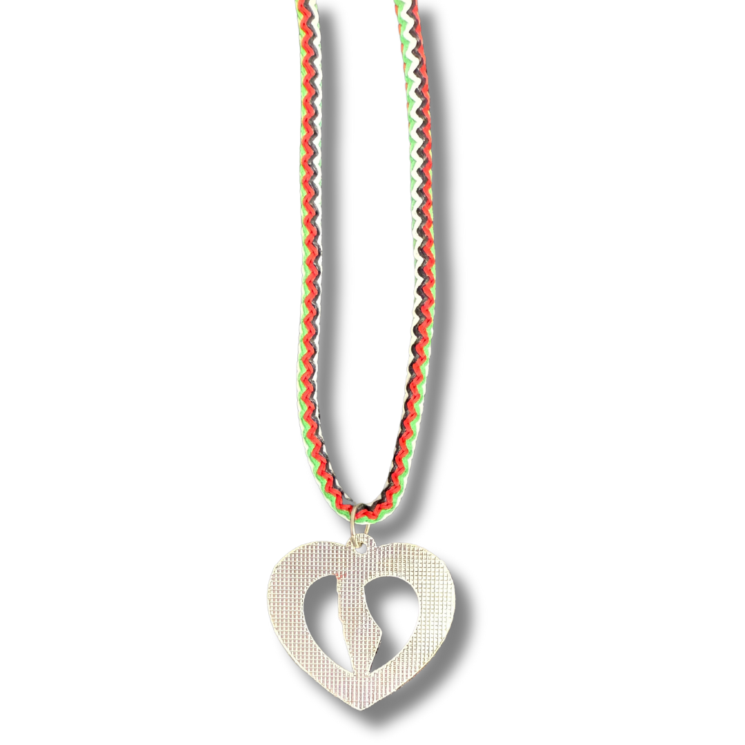 Palestinian Elegance Al Quds Heart necklace with silver heart pendant and colorful zigzag ribbon chain